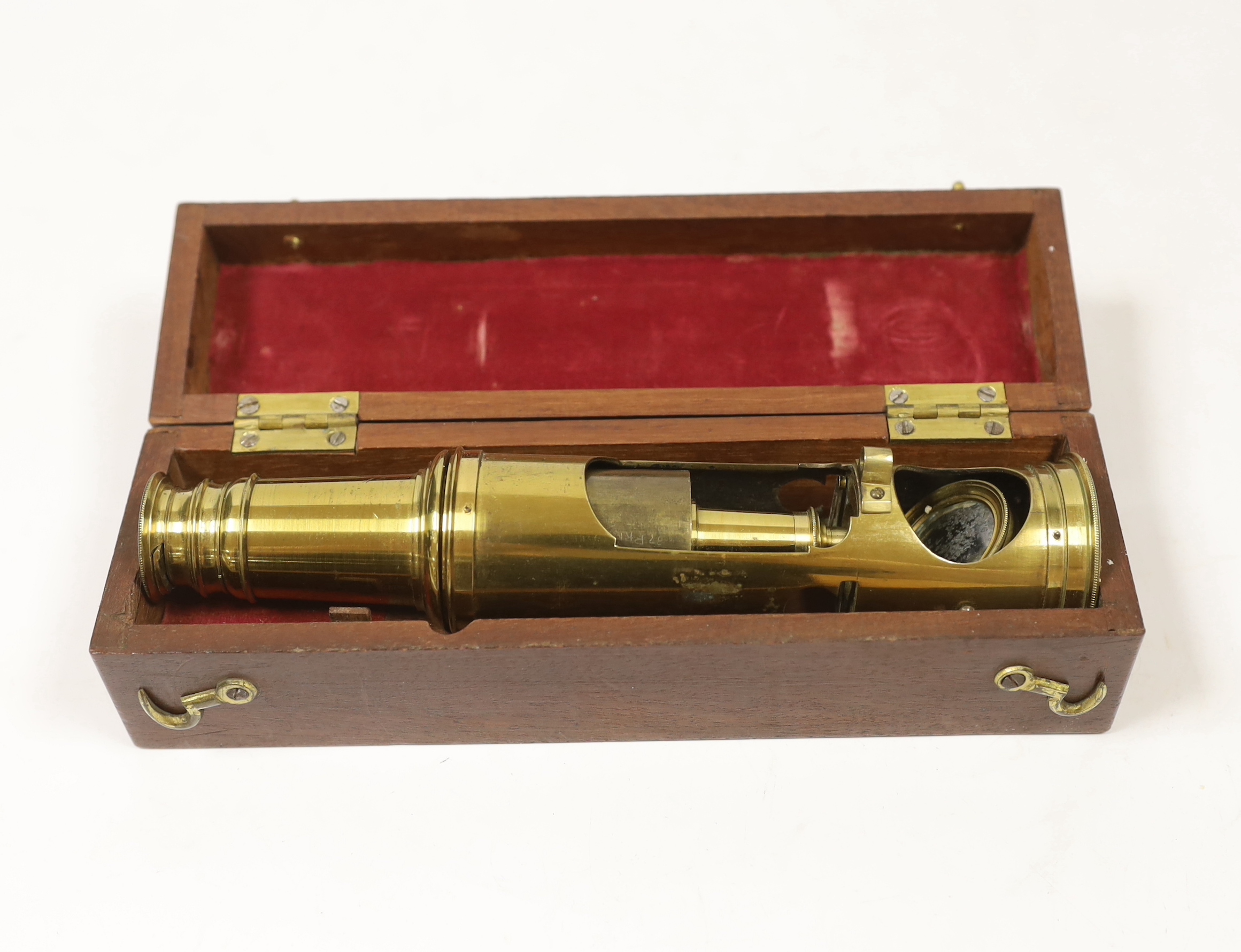 A boxed brass ‘drum’ style field microscope, in a fitted case, microscope 19cm high